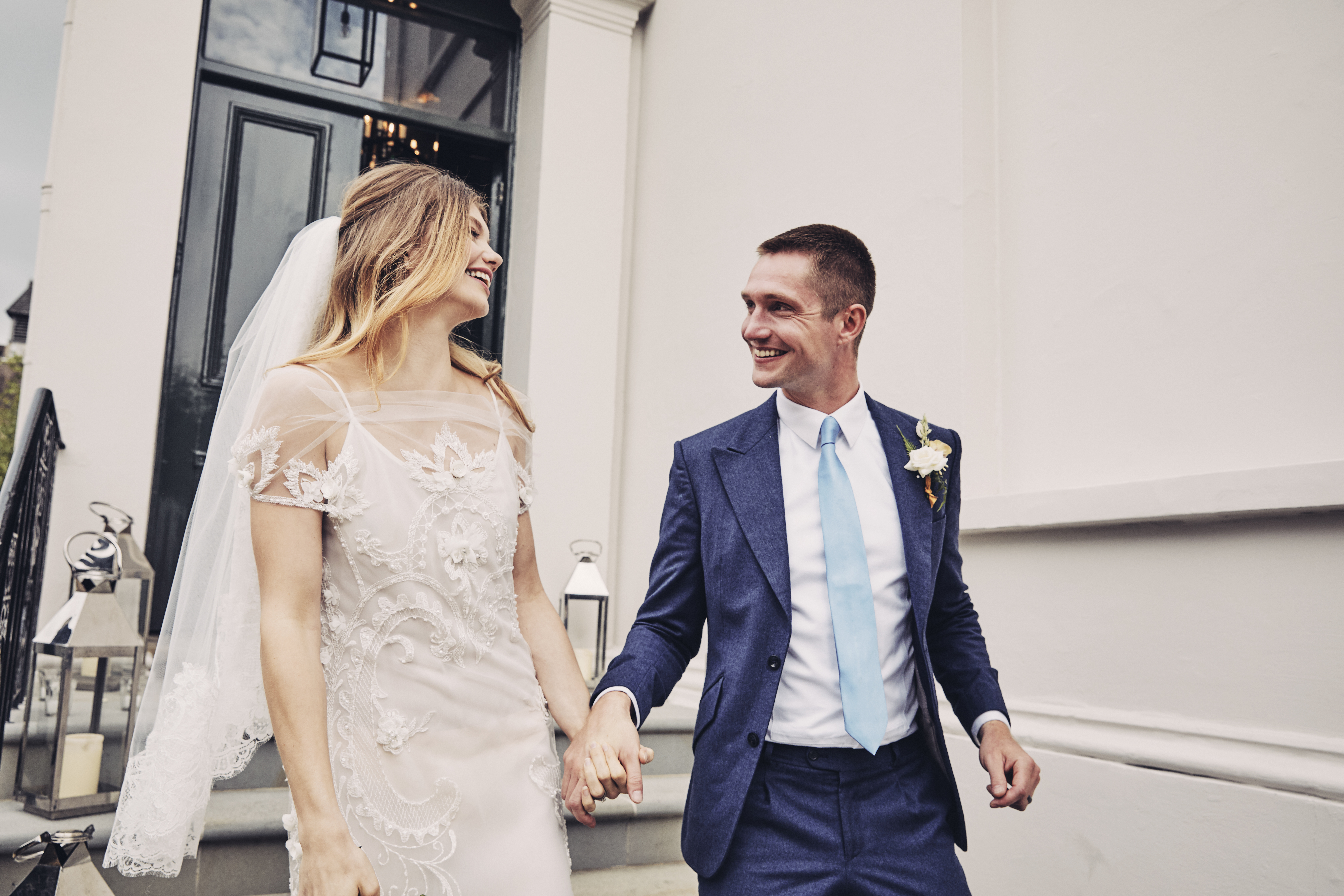 Happy bride and groom outside the wedding venue at no.131 Cheltenham
