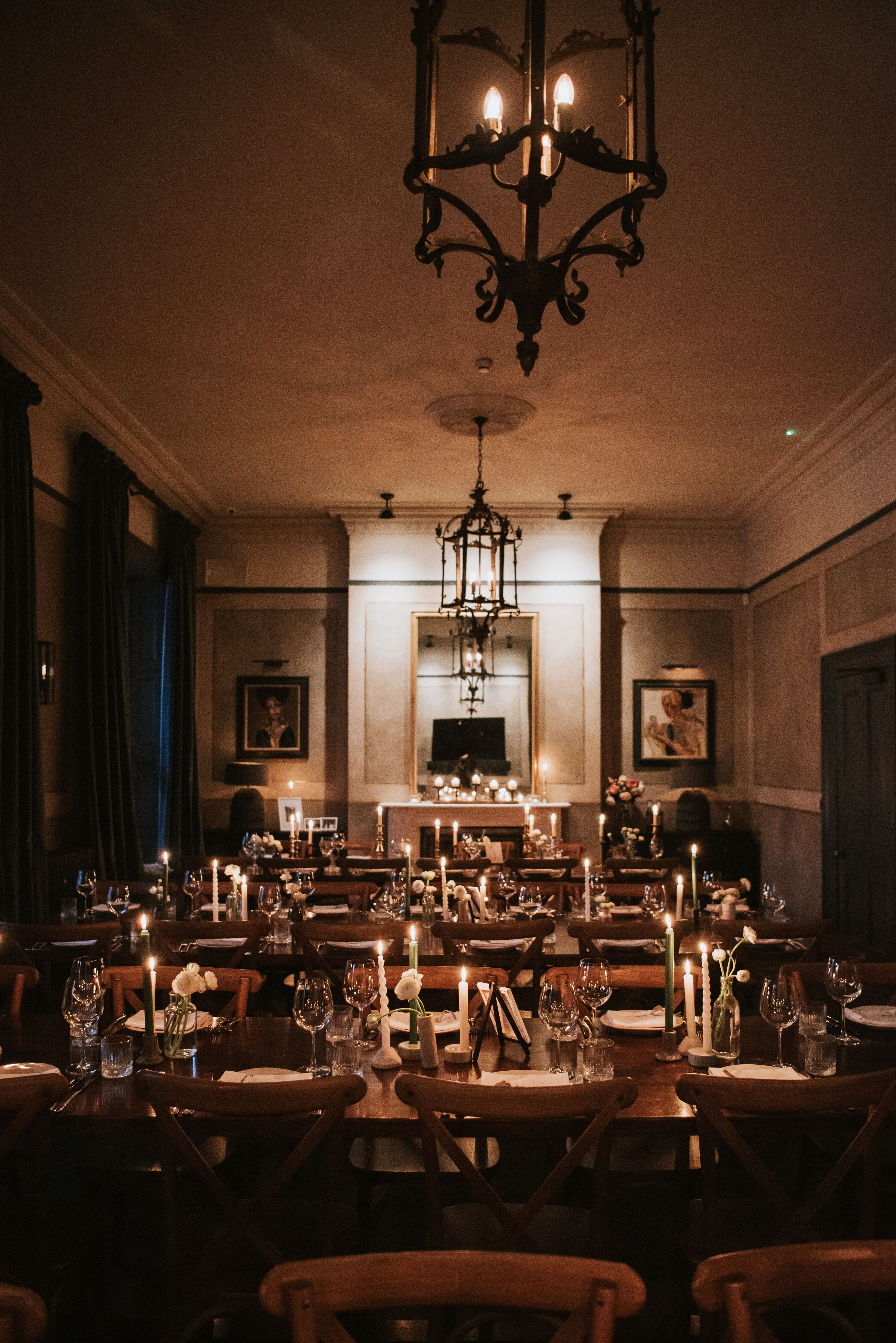 Wedding table setup in elegant room lit up with candles at no.131 Cheltenham